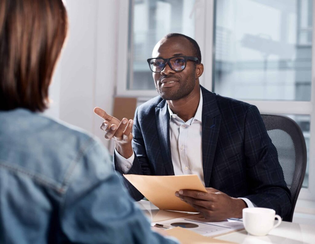 Skillful coworkers are discussing important project